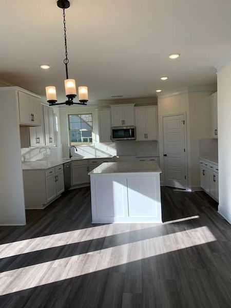 Furnished interior view inside a new home in Royal Pines, Trinity (Image 5).