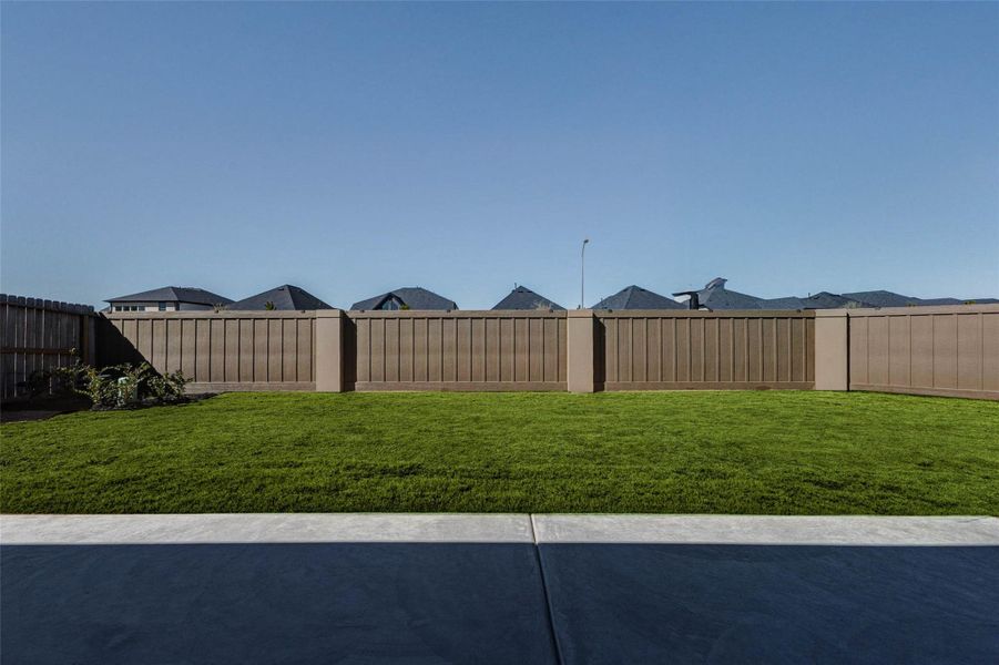 Exterior details and patio area of a home in Cross Creek West, Fulshear (Image 14).