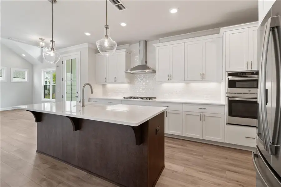 Furnished interior view inside a new home in Promenade at Sawnee Village, Cumming (Image 10).