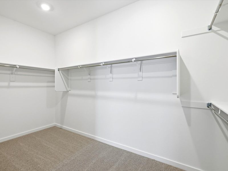 Spacious, unfurnished interior of a new home in White Tank Foothills Signature Series, Waddell (Image 12).