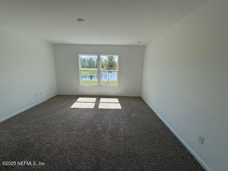 Spacious, unfurnished interior of a new home in Grand Reserve, Bunnell (Image 21).