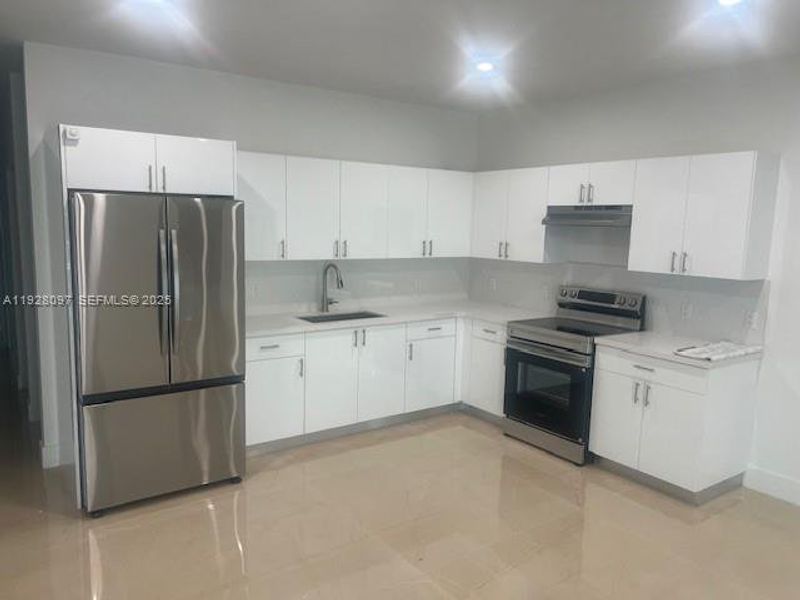 Furnished interior view inside a new home in , Miami (Image 6).