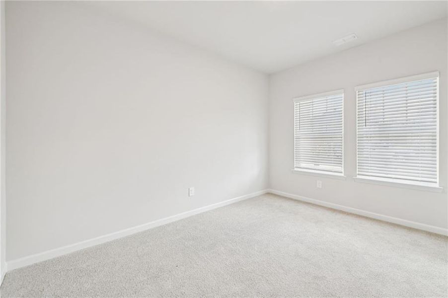 Spacious, unfurnished interior of a new home in Creekside at Oxford Park, Fairburn (Image 51).