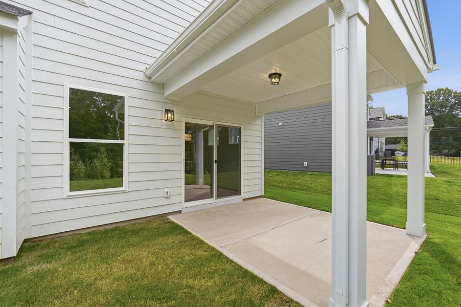 Exterior details and patio area of a home in Caldwell Forest, Charlotte (Image 3).