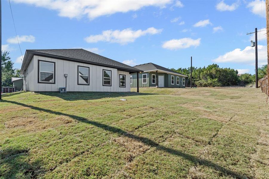 Exterior details and patio area of a home in , Granbury (Image 24).