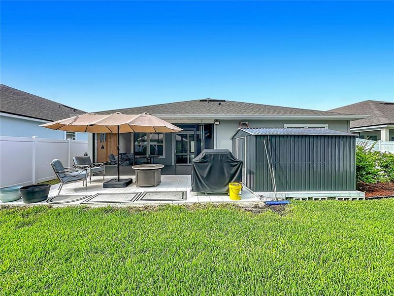 Exterior details and patio area of a home in Sawmill Branch Express, Palm Coast (Image 22).