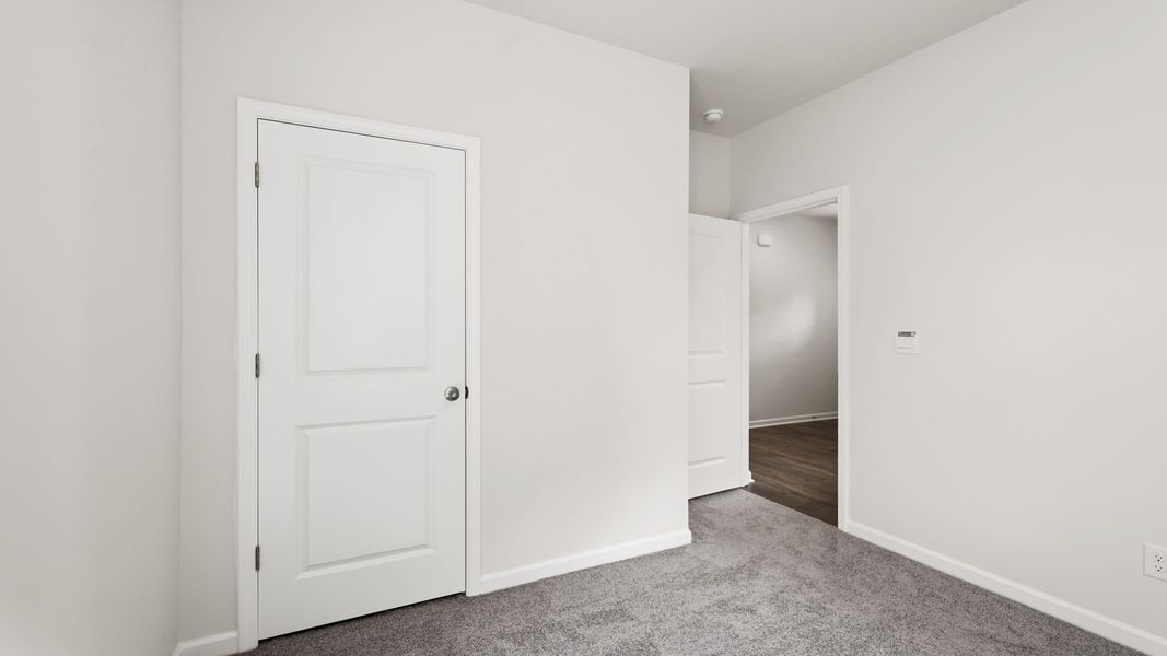 Spacious, unfurnished interior of a new home in Tap Root Farms, Fletcher (Image 17).