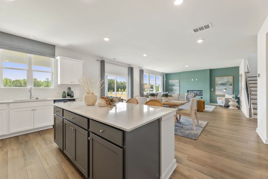 A kitchen with a large island. A kitchen with a large island.