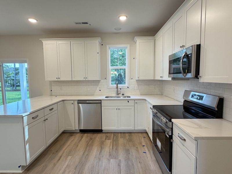 Furnished interior view inside a new home in Parkwood Estates, Leland (Image 15).