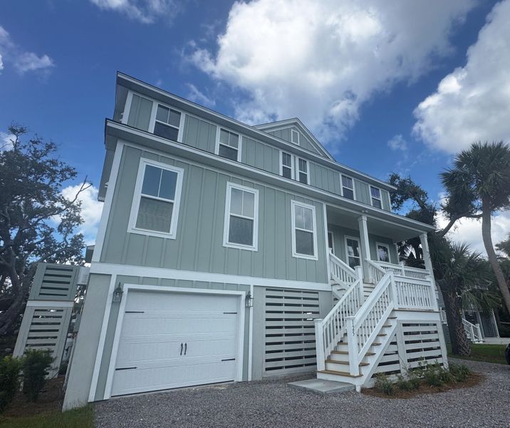 Front exterior of a new home in , Edisto Island, SC, highlighting curb appeal (Image 32). Front exterior of a new home in , Edisto Island, SC, highlighting curb appeal (Image 32).