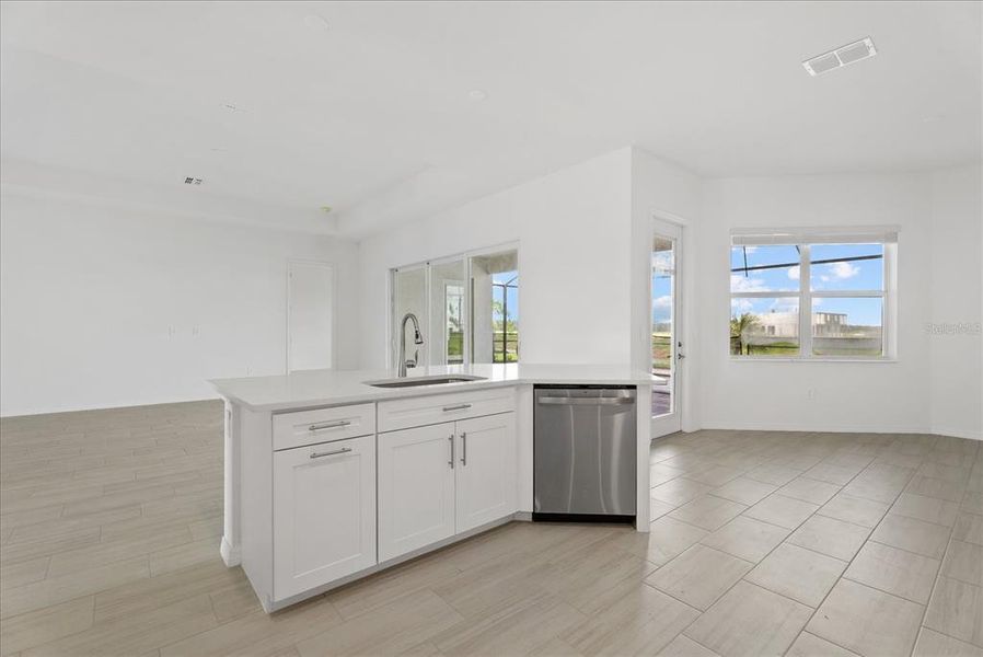 Furnished interior view inside a new home in Calusa Country Club, Lakewood Ranch (Image 5).