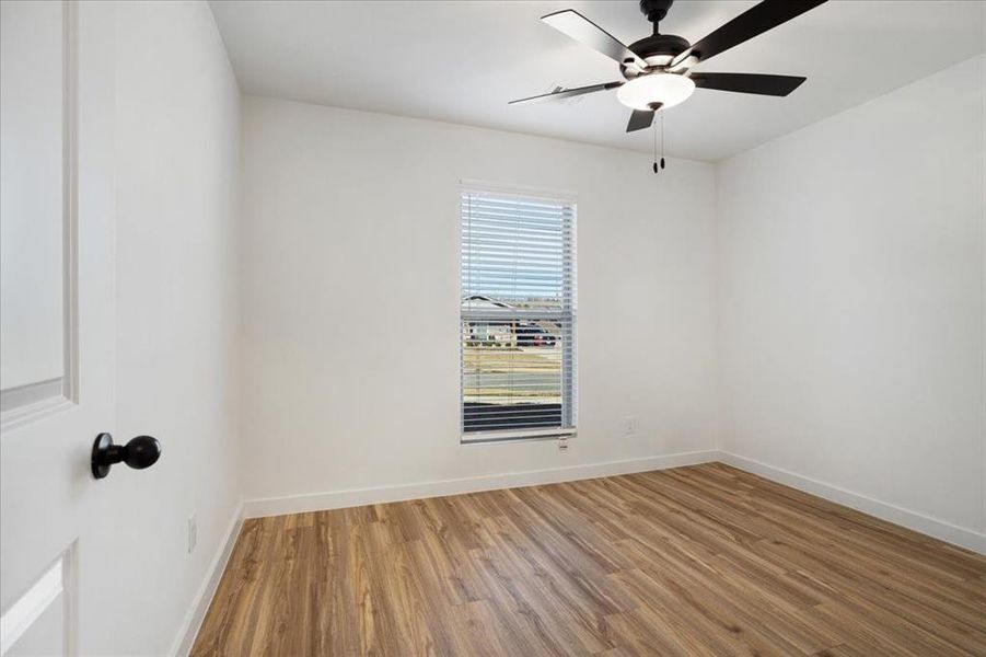 Spacious, unfurnished interior of a new home in Miller Street Cottages, Denison (Image 23).