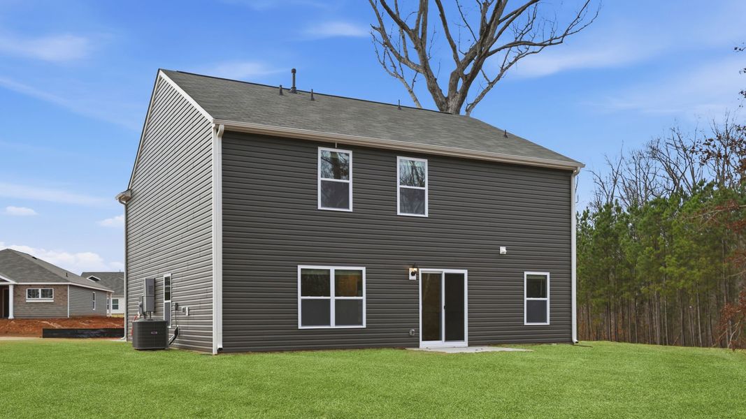 Exterior details and patio area of a home in Whitehawk Meadows, Travelers Rest (Image 3).