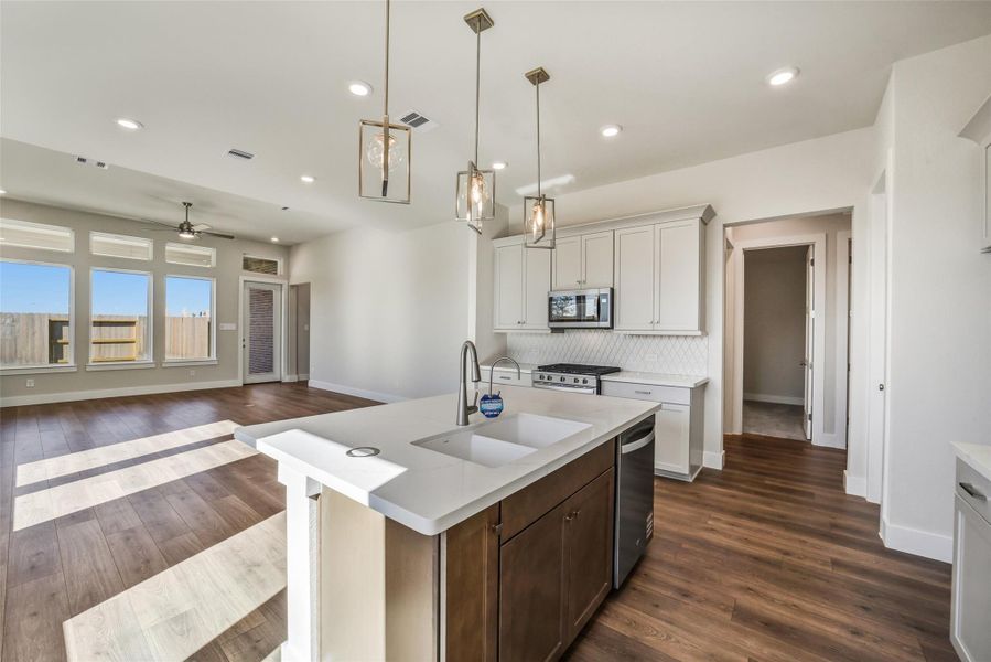 Furnished interior view inside a new home in Sunterra, Katy (Image 11).