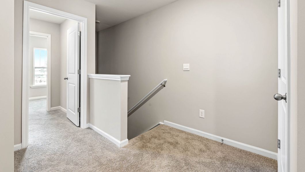 Spacious, unfurnished interior of a new home in Tanglewood Townes, Greenville (Image 21).