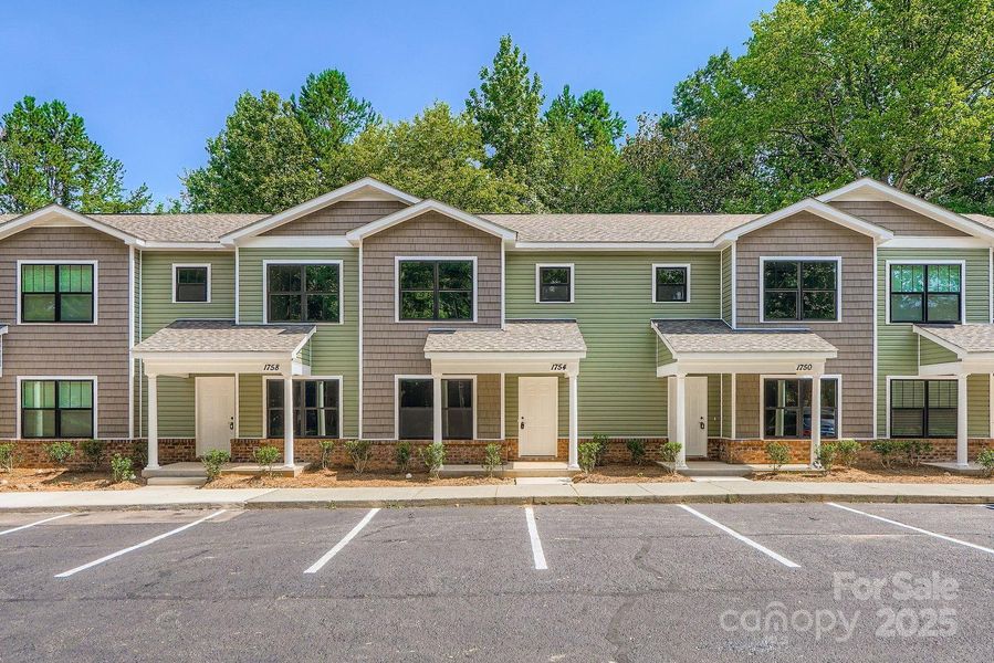 Front exterior of a new home in , Charlotte, NC, highlighting curb appeal (Image 18). Front exterior of a new home in , Charlotte, NC, highlighting curb appeal (Image 18).