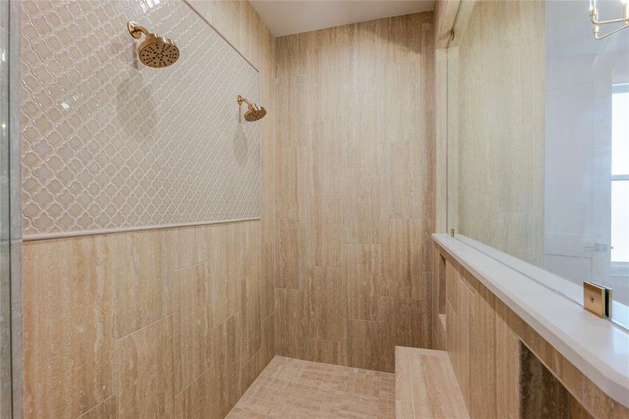 Oversized walk-in shower with sitting bench. Oversized walk-in shower with sitting bench.
