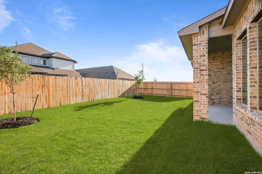 Exterior details and patio area of a home in Nopal Valley, San Antonio (Image 27).