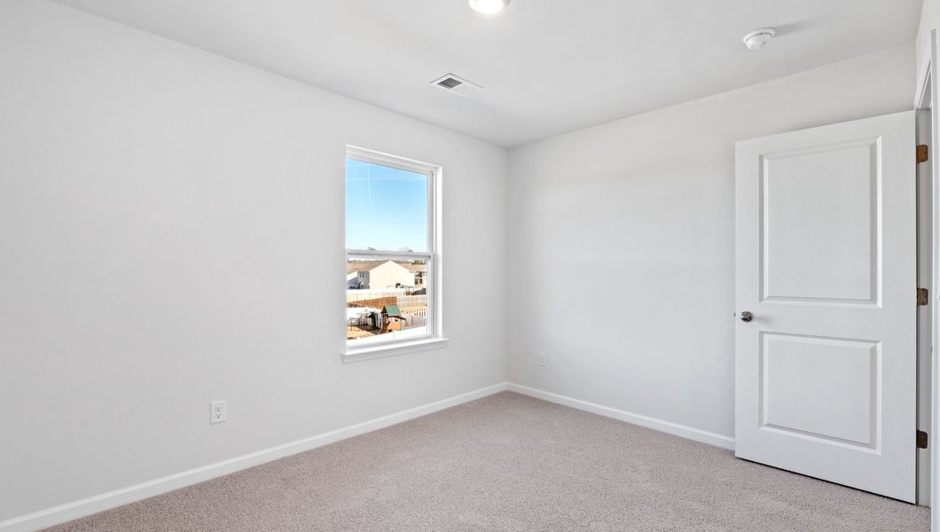 Representative unfurnished interior of a home built from the PENWELL by D.R. Horton in Cascade Point, Seneca (Image 25).