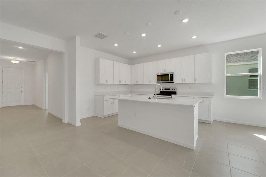 Furnished interior view inside a new home in Willowbrook North, Winter Haven (Image 5).