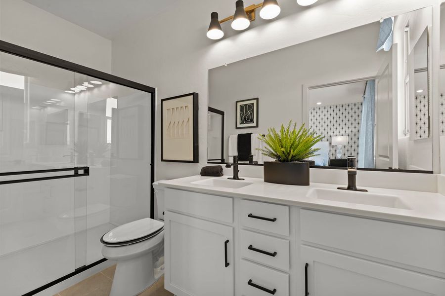 Optional shower with cultured marble surround at primary bath