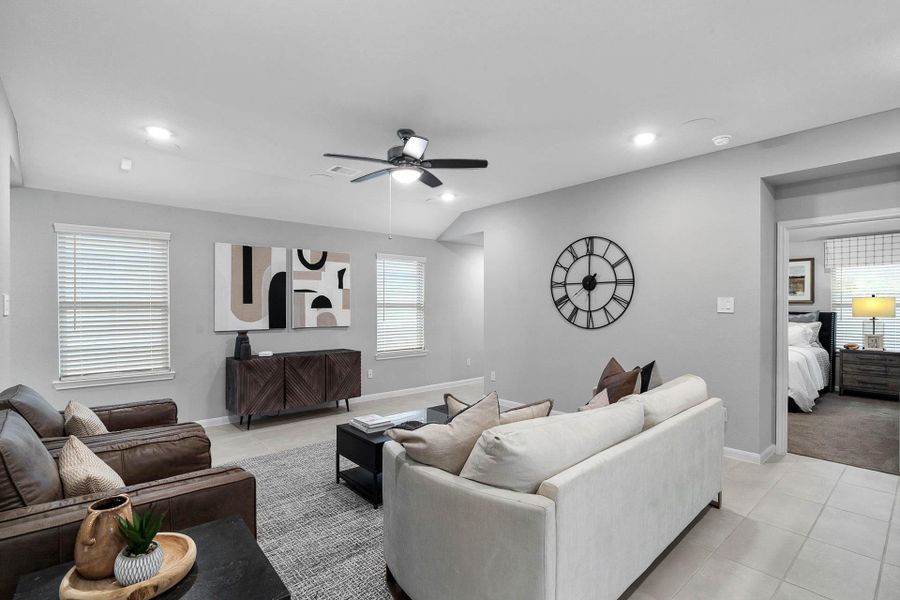 Enjoy the convenience of a main living space that offers direct, open access to the private primary bedroom retreat, providing an ideal flow between gathering spaces and private quarters.