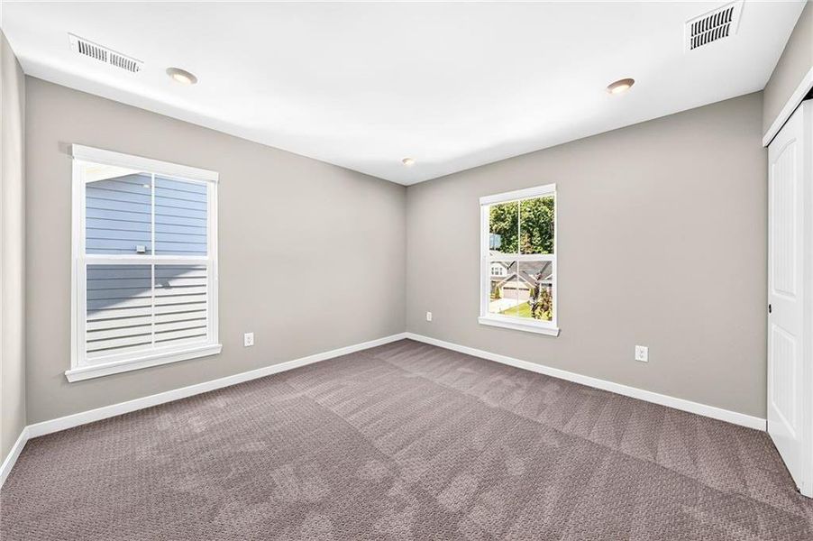 Spacious, unfurnished interior of a new home in The Reserve At Liberty Park, Braselton (Image 42).