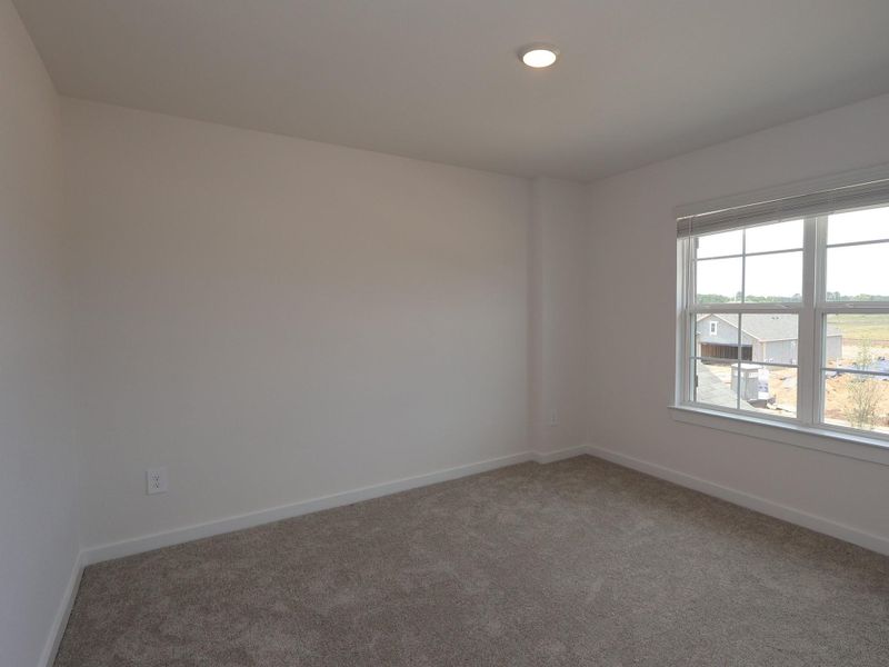 Spacious, unfurnished interior of a new home in Lone Star Landing, Montgomery (Image 17).