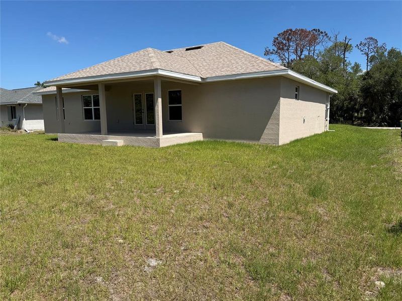 Exterior details and patio area of a home in Port Charlotte, Port Charlotte (Image 16).