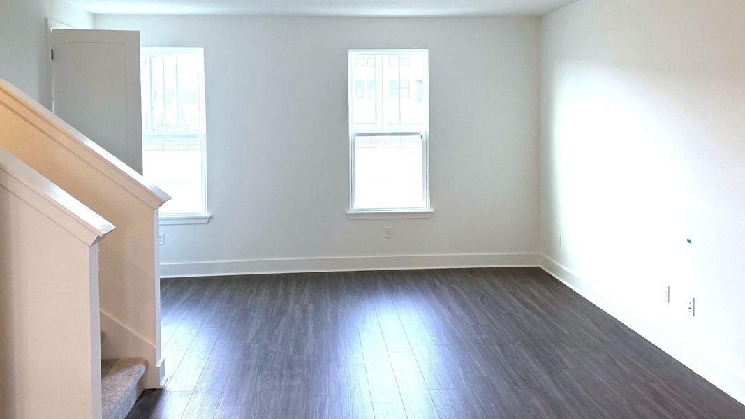 Furnished interior view inside a new home in Parkview at Hamlin, Winter Garden (Image 6).