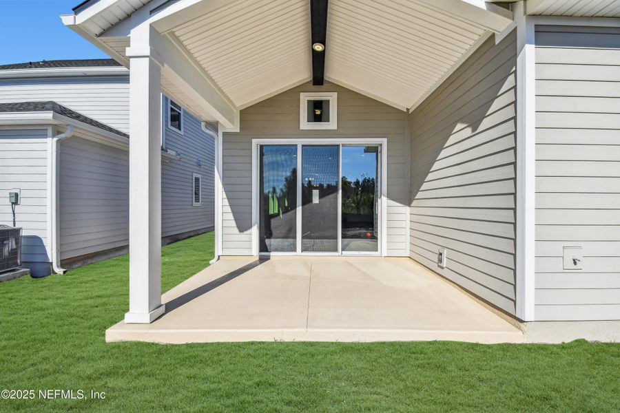 Exterior details and patio area of a home in Evergreen Island at Silverleaf - Executive, St. Augustine (Image 3). Exterior details and patio area of a home in Evergreen Island at Silverleaf - Executive, St. Augustine (Image 3).
