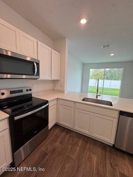 Furnished interior view inside a new home in The Landing, Middleburg (Image 37).
