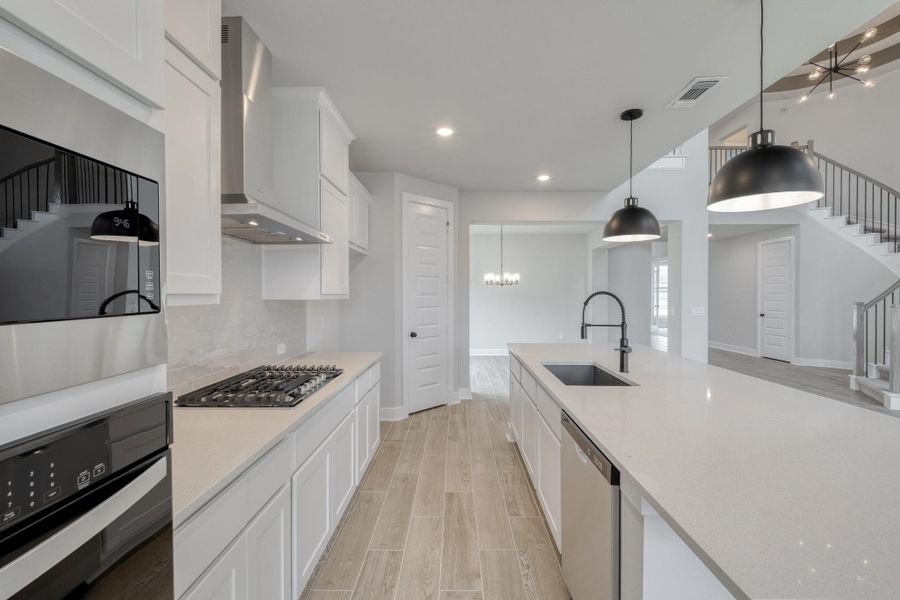 Furnished interior view inside a new home in The Colony, Bastrop (Image 9).
