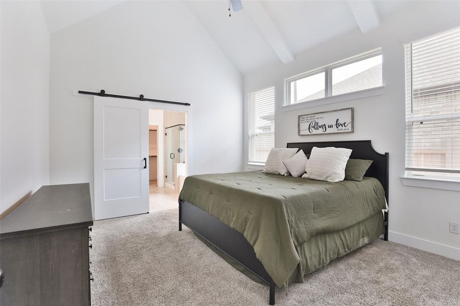 Step into the primary bedroom, where vaulted ceilings add an impressive sense of space and openness. Step into the primary bedroom, where vaulted ceilings add an impressive sense of space and openness.
