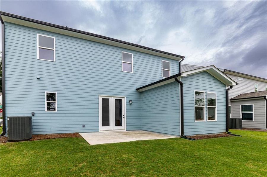 Exterior details and patio area of a home in Enclave at Edgewater, Canton (Image 3).