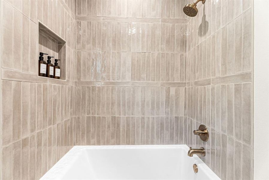 Bathroom featuring tub / shower combination