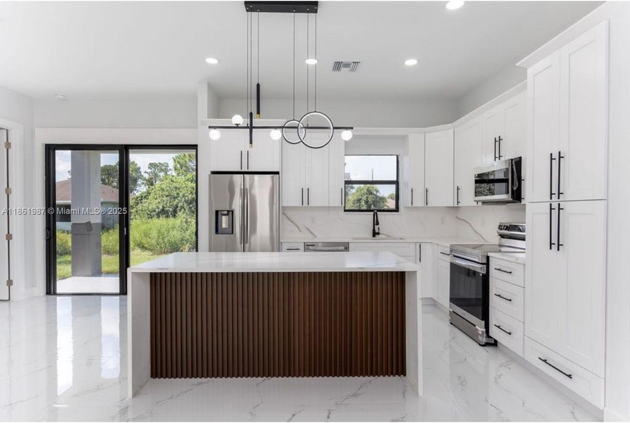 Furnished interior view inside a new home in , Lehigh Acres (Image 3). Furnished interior view inside a new home in , Lehigh Acres (Image 3).