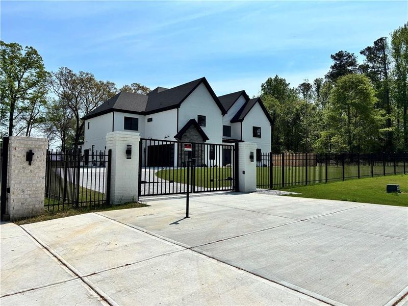 Front exterior of a new home in , Buford, GA, highlighting curb appeal (Image 30).