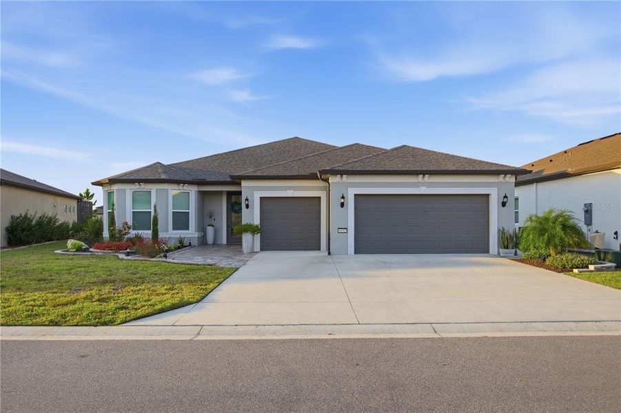 Front exterior of a new home in , Ocala, FL, highlighting curb appeal (Image 24).