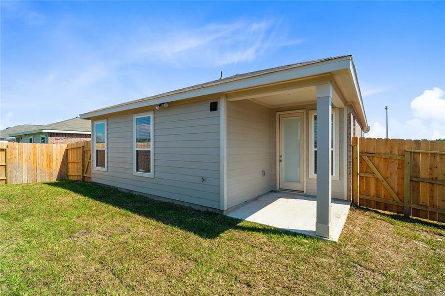 Come and see this spacious backyard with its beautiful covered patio. There is plenty of room for the kids to play and adults to relax!