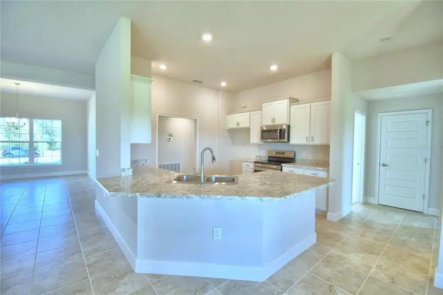 Furnished interior view inside a new home in Cadence Crossing, Auburndale (Image 9).