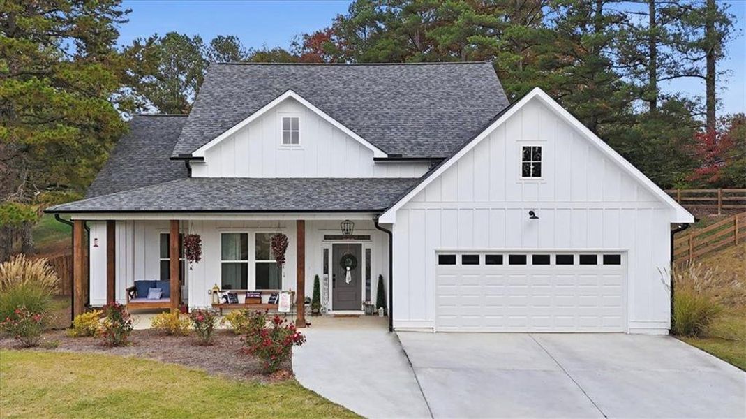 Front exterior of a new home in , Calhoun, GA, highlighting curb appeal (Image 1).
