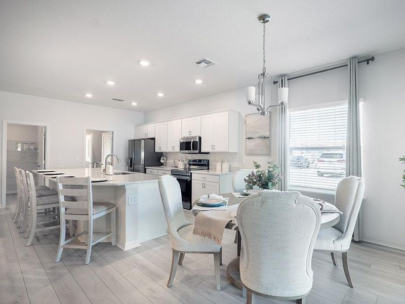 Dine in the sunny cafe, or at the island - Shelby II by Highland Homes