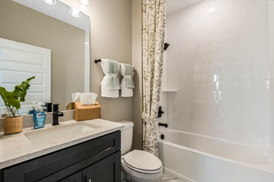 Furnished interior view inside a new home in Harvest at Ovation - Townhomes, Winter Garden (Image 27).