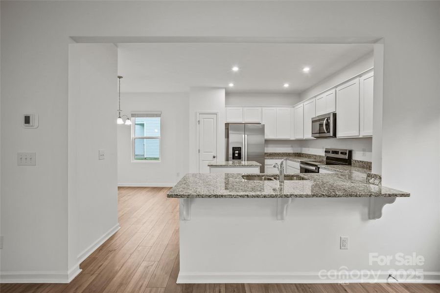 Furnished interior view inside a new home in Parkside Crossing, Charlotte (Image 4).