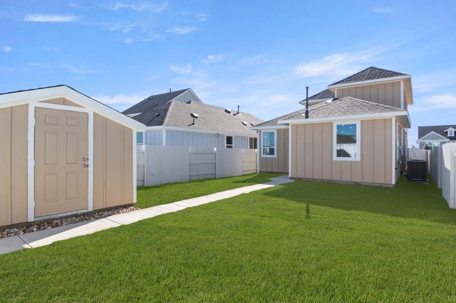 Exterior details and patio area of a home in Harvest Ridge, Elgin (Image 3).