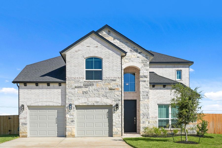 Front exterior of a new home in Beacon Hill, Waller, TX, highlighting curb appeal (Image 16). Front exterior of a new home in Beacon Hill, Waller, TX, highlighting curb appeal (Image 16).
