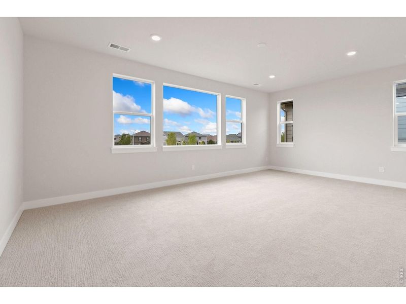 Spacious, unfurnished interior of a new home in RainDance, Windsor (Image 8).