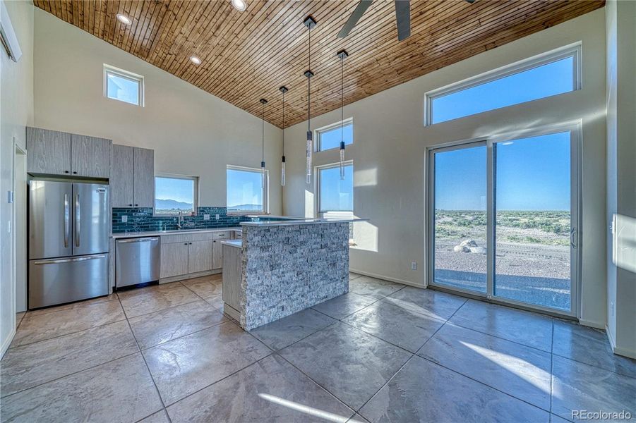 Kitchen with stone and tile accents