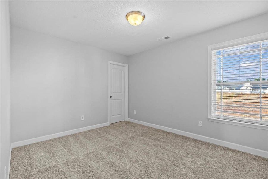 Spacious, unfurnished interior of a new home in Zanes Creek, Inman (Image 25).